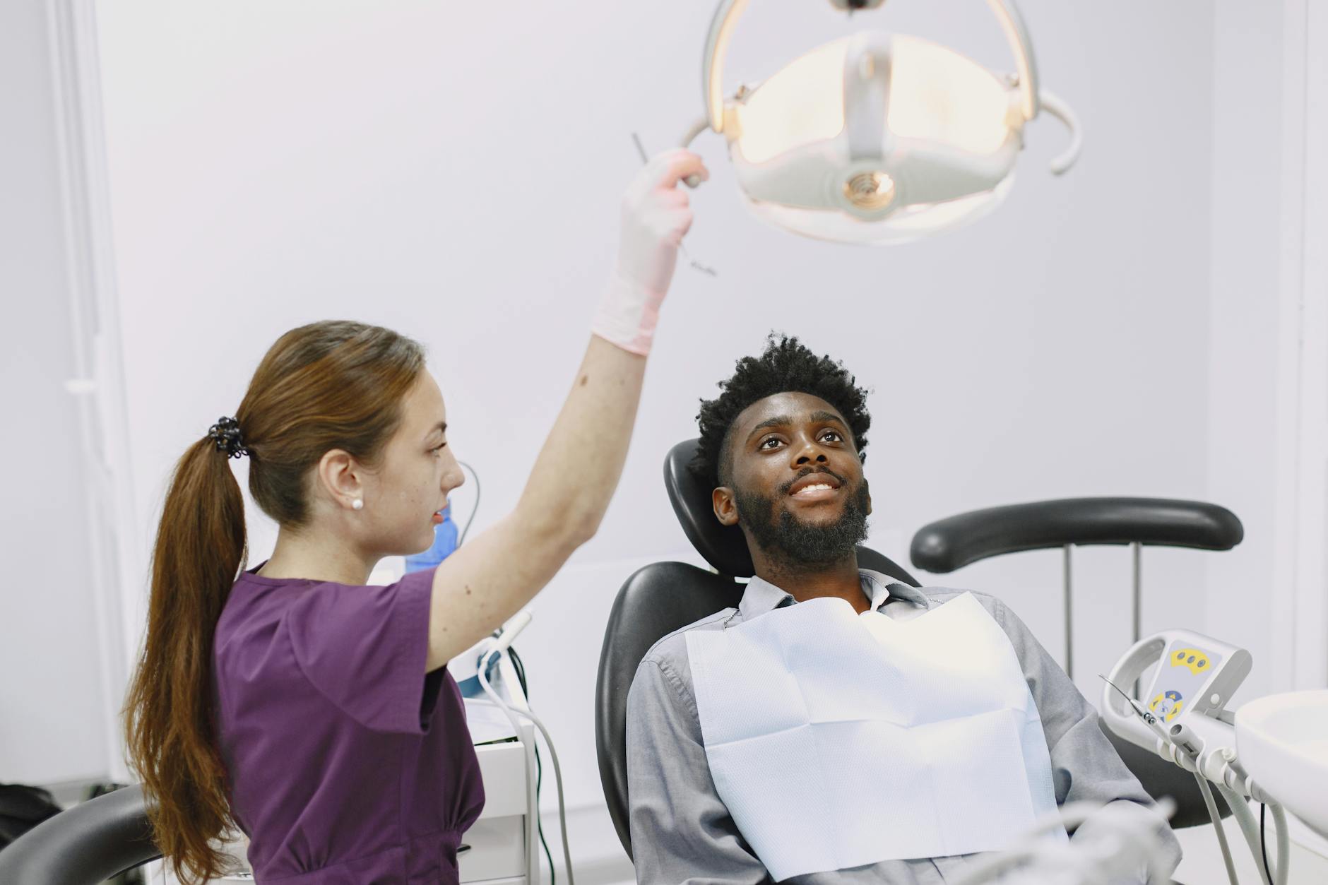 dentist with patient in office