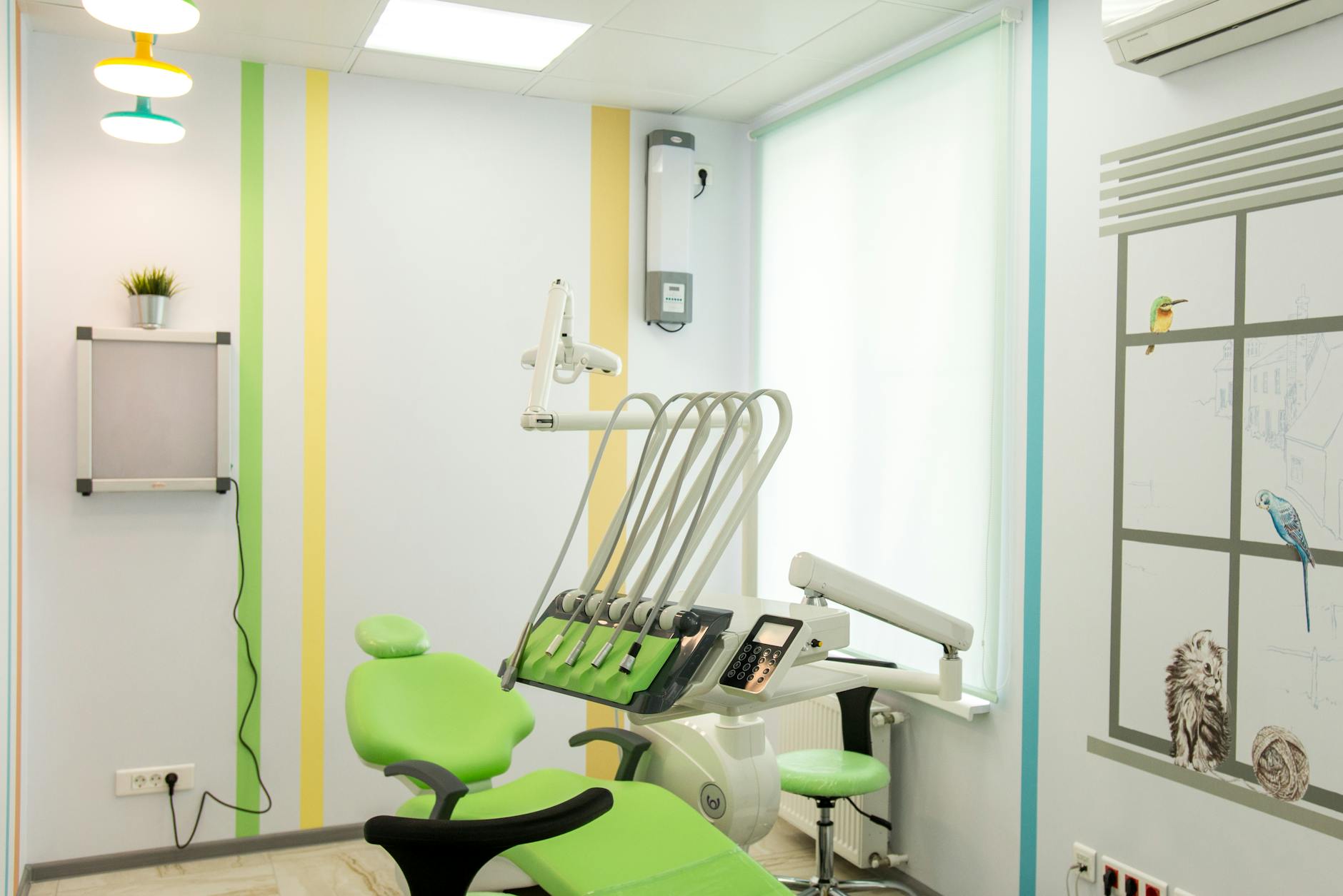 dentists office with a green chair